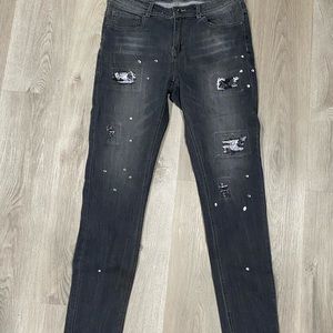 Distressed denim jeans